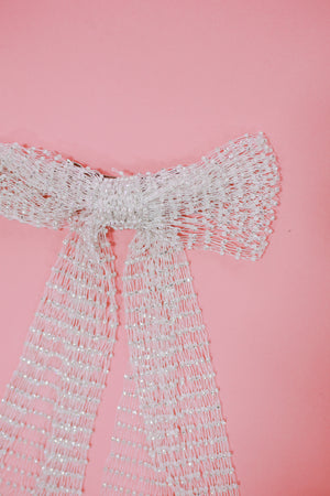 Details Await Mesh Bow In White