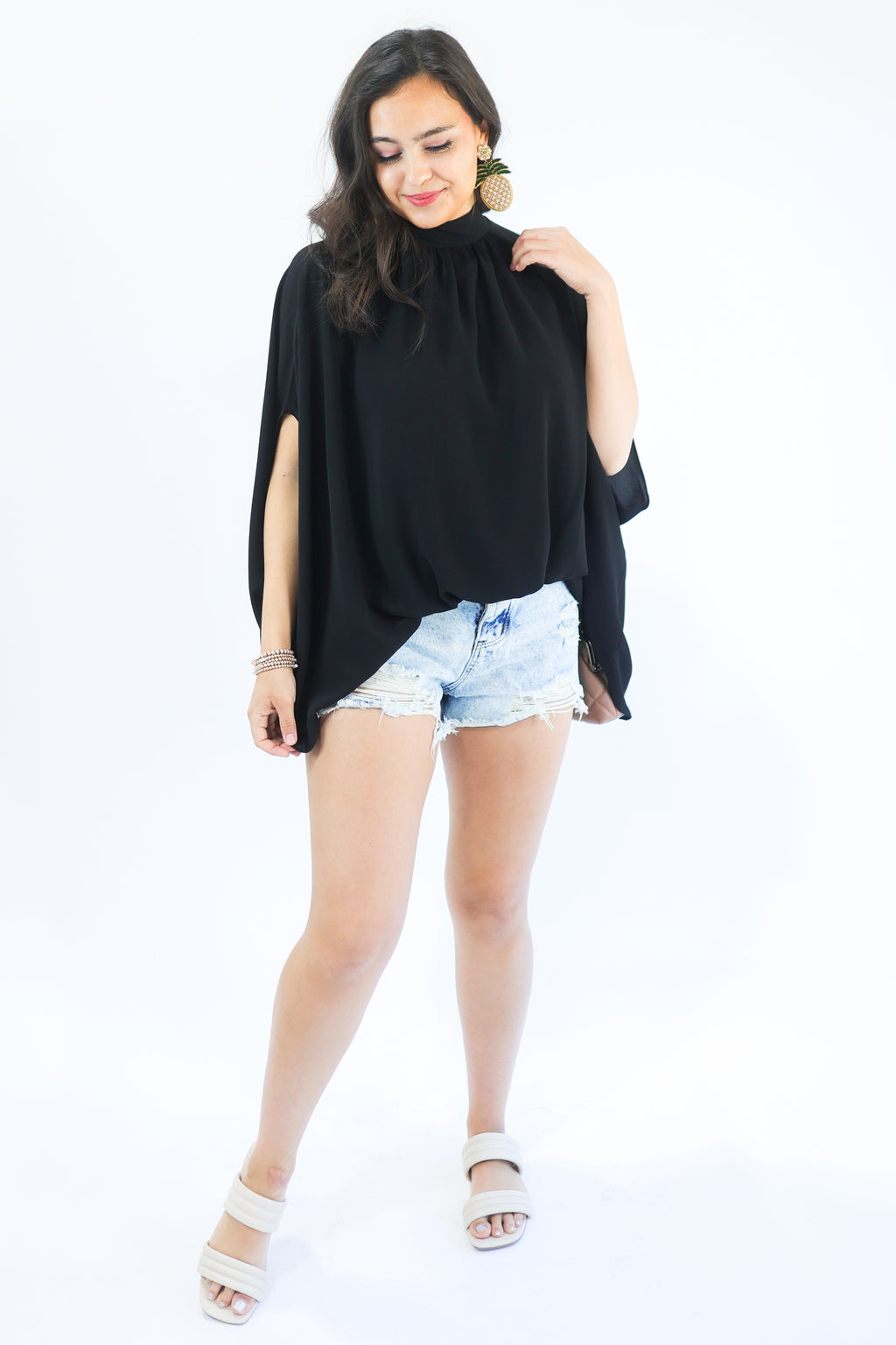 Top Notch Shift Top In Black