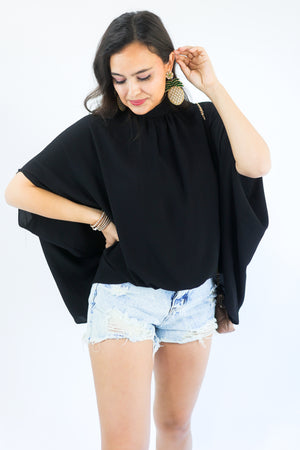 Top Notch Shift Top In Black