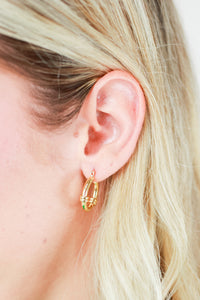 Pulling All Together Huggie Earrings In Gold