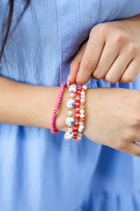 Flower Beaded Bracelet Stack In Pink