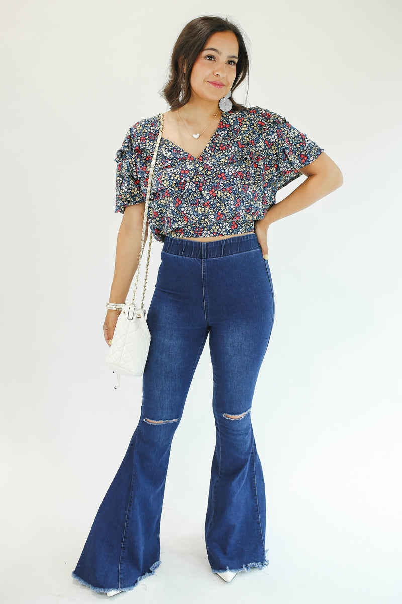 The Logan High Waist Flares In Dark Denim