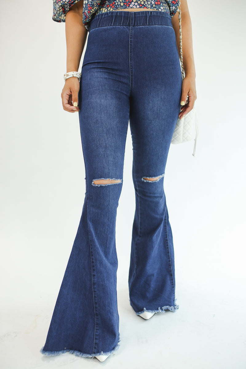 The Logan High Waist Flares In Dark Denim